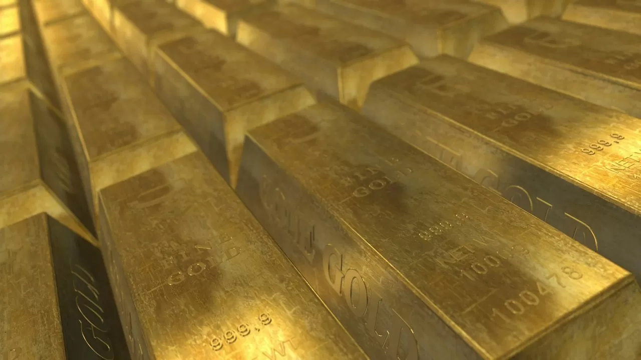 Ouro fecha estável na véspera de Natal após recordes e realização de lucros